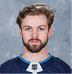 WINNIPEG, MB - SEPTEMBER 12: Josh Morrissey #44 of the Winnipeg Jets poses for his official headshot for the 2019-2020 season on September 12, 2019 at the Bell MTS Iceplex in Winnipeg, Manitoba, Canada   (Photo by Jonathan Kozub NHLI via Getty Images) *** Local Caption *** Josh Morrissey