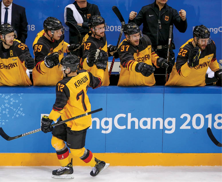 GANGNEUNG, SOUTH KOREA - FEBRUARY 25: Dominik Kahun of Germany celebrates his goal with the bench during the Men's Ice Hockey Gold Medal match between Germany and Olympic Athlete from Russia on day sixteen of the PyeongChang 2018 Winter Olympic Games at Gangneung Hockey Centre on February 25, 2018 in Gangneung, South Korea  (Photo by Jean Catuffe Getty Images)