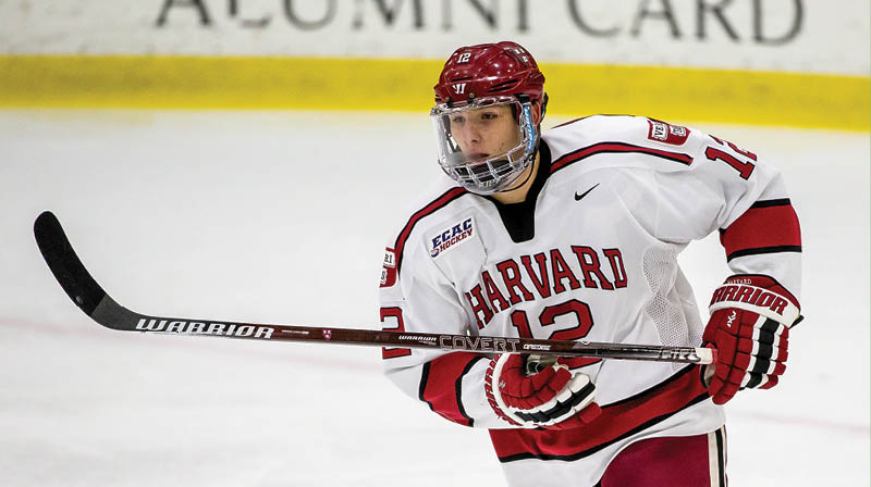 BOSTON, MA - JANUARY 8: John Marino #12 of the Harvard Crimson skates against the Boston University Terriers during NCAA hockey at The Bright-Landry Hockey Center on January 8, 2019 in Boston, Massachusetts  The game ended in a 2-2 tie  (Photo by Richard T Gagnon Getty Images)