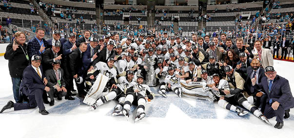 SAN JOSE, CA - JUNE 12:  The Pittsburgh Penguins celebrate with the Stanley Cup after their 3-1 win over the San Jose Sharks in Game 6 of the 2016 NHL Stanley Cup Final at SAP Center on June 12, 2016 in San Jose, California  The Penguins won the series 4-2   (Photo by Gregory Shamus NHLI via Getty Images)
