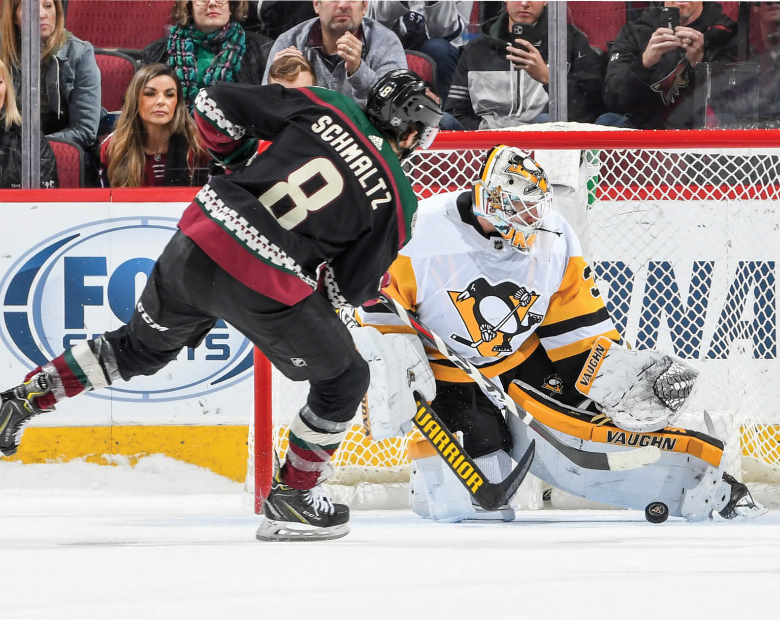GLENDALE, ARIZONA - JANUARY 12: Goalie Tristian Jarry #35 of the Pittsburgh Penguins makes a save on the shot by Nick Schmaltz #8 of the Arizona Coyotes during a shootout of the NHL hockey game at Gila River Arena on January 12, 2020 in Glendale, Arizona  (Photo by Norm Hall NHLI via Getty Images)