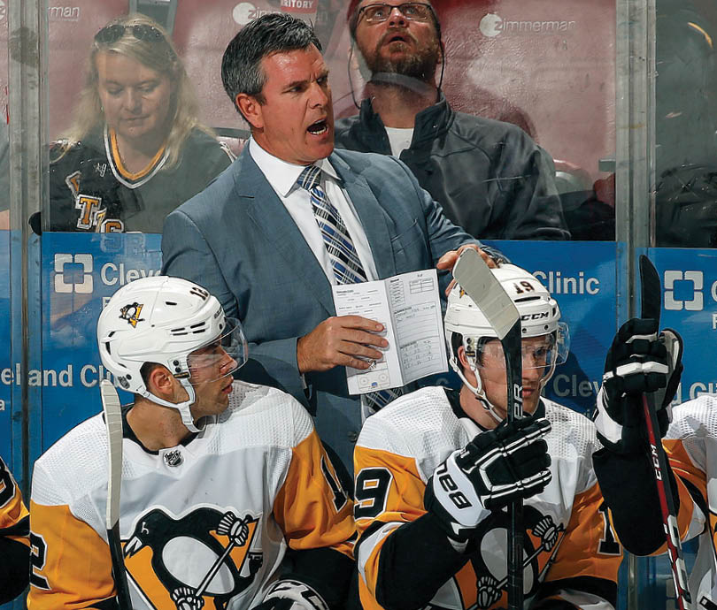 SUNRISE, FL - OCT  22: Pittsburgh Penguins Head Coach Mike Sullivan directs his team from the bench against the Florida Panthers at the BB&T Center on October 22, 2019 in Sunrise, Florida  (Photo by Eliot J  Schechter NHLI via Getty Images)