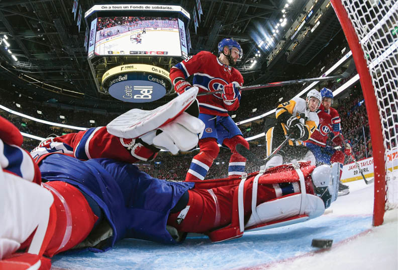 MONTREAL, QC - JANUARY 4: Brandon Tanev #13 of the Pittsburgh Penguins scores the winning goal on goalie Carey Price #31 of the Montreal Canadiens in the NHL game at the Bell Centre on January 4, 2020 in Montreal, Quebec, Canada  (Photo by Francois Lacasse NHLI via Getty Images)
