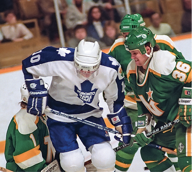 TORONTO, ON - DECEMBER 18: Kari Takko #1 and Chris Pryor #36 of the Minnesota North Stars skate against Vince Damphousse #10 of the Toronto Maple Leafs during NHL game action on December 18, 1986 at Maple Leaf Gardens in Toronto, Ontario, Canada  (Photo by Graig Abel Getty Images)