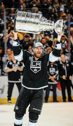 13 June 2014: Los Angeles Kings Center Jeff Carter (77)  3492  skates with the Stanley Cup during the post game celebration of the Stanley Cup Final between the New York Rangers and the Los Angeles Kings at Staples Center in Los Angeles, CA  The Kings defeated the Rangers 3-2 to win the Stanley Cup  (Photo by Chris Williams Icon Sportswire via Getty Images)