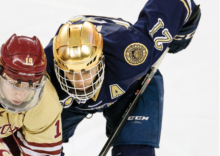 CHESTNUT HILL, MA - MARCH 1: Ryan Fitzgerald #19 of the Boston College Eagles battles Bryan Rust #21 of the Notre Dame Fighting Irish during NCAA hockey action at Kelley Rink on March 1, 2014 in Chestnut Hill, Massachusetts  (Photo by Richard T Gagnon Getty Images)