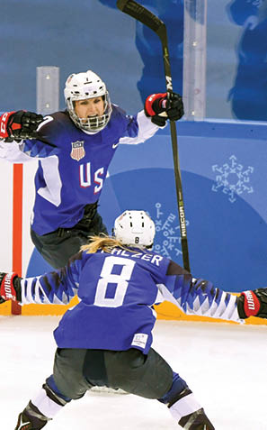GANGNEUNG, SOUTH KOREA - FEBRUARY 22:  Monique Lamoureux-Morando #7 of the United States celebrates after scoring a goal with Emily Pfalzer #8 of the United States against Canada in the third period during the Women's Gold Medal Game on day thirteen of the PyeongChang 2018 Winter Olympic Games at Gangneung Hockey Centre on February 22, 2018 in Gangneung, South Korea   (Photo by Harry How Getty Images)