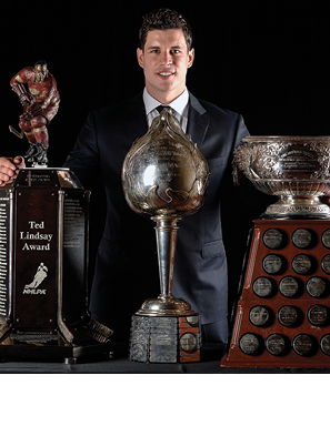 LAS VEGAS, NV - JUNE 24:  Sidney Crosby of the Pittsburgh Penguins poses with the Ted Lindsay Award, the Hart Memorial Trophy, and the Art Ross Trophy during the 2014 NHL Awards at the Encore Theater at Wynn Las Vegas on June 24, 2014 in Las Vegas, Nevada   (Photo by Harry How Getty Images)