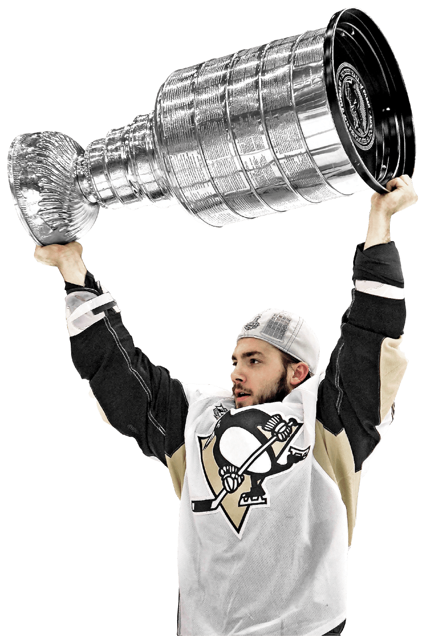DETROIT - JUNE 12:  Kris Letang #58 of the Pittsburgh Penguins celebrates with the Stanley Cup after defeating the Detroit Red Wings by a score of 2-1 to win Game Seven and the 2009 NHL Stanley Cup Finals at Joe Louis Arena on June 12, 2009 in Detroit, Michigan   (Photo by Jim McIsaac Getty Images)