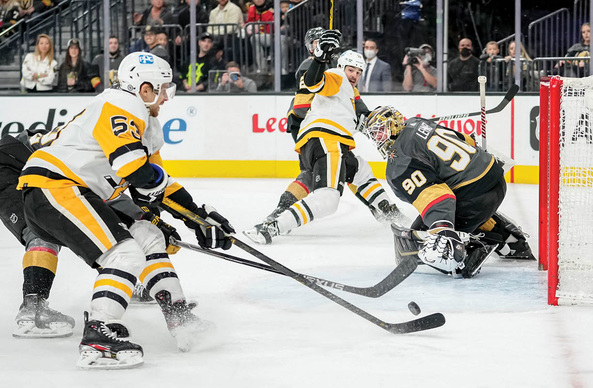 LAS VEGAS, NEVADA - JANUARY 17: Teddy Blueger #53 of the Pittsburgh Penguins shoots the puck to score a goal during the second period of a game against the Vegas Golden Knights at T-Mobile Arena on January 17, 2022 in Las Vegas, Nevada  (Photo by Jeff Bottari NHLI via Getty Images)