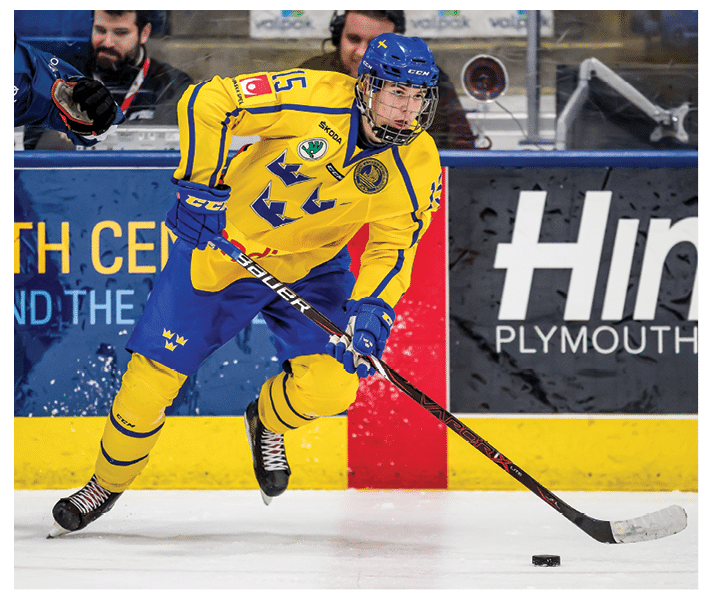 PLYMOUTH, MI - FEBRUARY 15: Filip Hallander #15 of the Sweden Nationals turns up ice with the puck against the Finland Nationals during the 2018 Under-18 Five Nations Tournament game at USA Hockey Arena on February 15, 2018 in Plymouth, Michigan  Finland defeated Sweden 5-3  (Photo by Dave Reginek Getty Images)*** Local Caption *** Filip Hallander