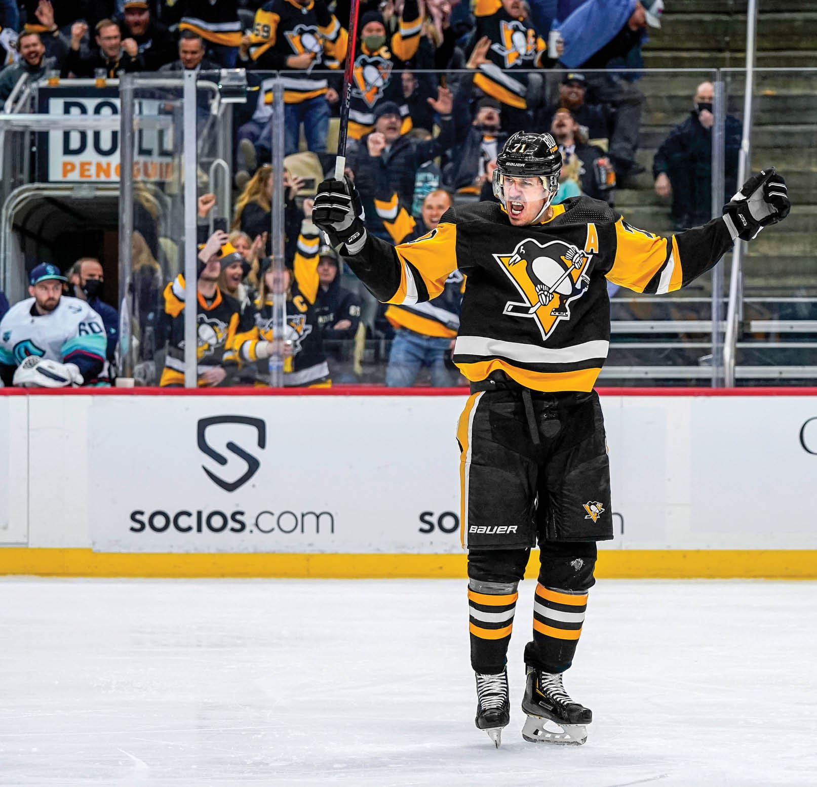 PITTSBURGH, PA - JANUARY 27: Pittsburgh Penguins Center Evgeni Malkin (71) reacts in celebration after scoring a goal during the third period in the NHL game between the Pittsburgh Penguins and the Seattle Kraken on January 27, 2022, at PPG Paints Arena in Pittsburgh, PA  (Photo by Jeanine Leech Icon Sportswire via Getty Images)