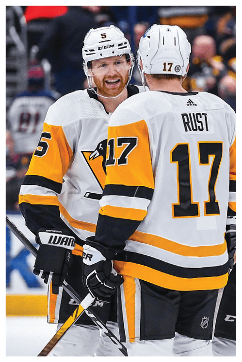 COLUMBUS, OH - JANUARY 21: Sidney Crosby #87 of the Pittsburgh Penguins (R) celebrates his third goal of the game with Bryan Rust #17 and Mike Matheson #5 during the third period against the Columbus Blue Jackets at Nationwide Arena on January 21, 2022 in Columbus, Ohio   (Photo by Ben Jackson NHLI via Getty Images)