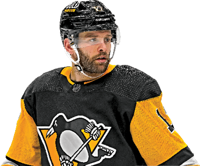 PITTSBURGH, PA - FEBRUARY 01: Pittsburgh Penguins Right Wing Bryan Rust (17) looks on during the second period in the NHL game between the Pittsburgh Penguins and the Washington Capitals on February 1, 2022, at PPG Paints Arena in Pittsburgh, PA  (Photo by Jeanine Leech Icon Sportswire via Getty Images)