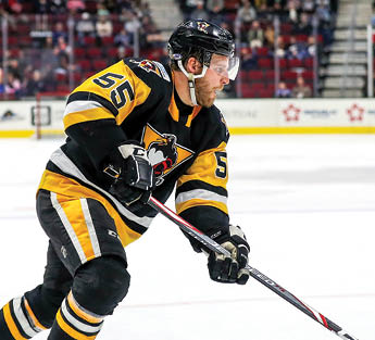 CLEVELAND, OH - DECEMBER 13: Wilkes-Barre Scranton Penguins defenceman Jon Lizotte (55) controls the puck during the third period of the American Hockey League game between the Wilkes-Barre Scranton Penguins and Cleveland Monsters on December 13,2019, at Rocket Mortgage FieldHouse in Cleveland, OH  (Photo by Frank Jansky Icon Sportswire via Getty Images)