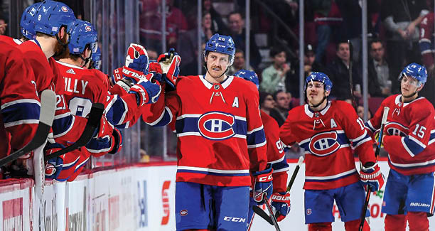 MONTREAL, QC - NOVEMBER 19: Jeff Petry #26 of the Montreal Canadiens celebrates with the bench after scoring a goal against the Washington Capitals in the NHL game at the Bell Centre on November 19, 2018 in Montreal, Quebec, Canada  (Photo by Francois Lacasse NHLI via Getty Images) 
