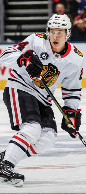 TORONTO, ON - MARCH 13: Dominik Kahun #24 of the Chicago Blackhawks skates against the Toronto Maple Leafs during the third period at the Scotiabank Arena on March 13, 2019 in Toronto, Ontario, Canada  (Photo by Kevin Sousa NHLI via Getty Images)
