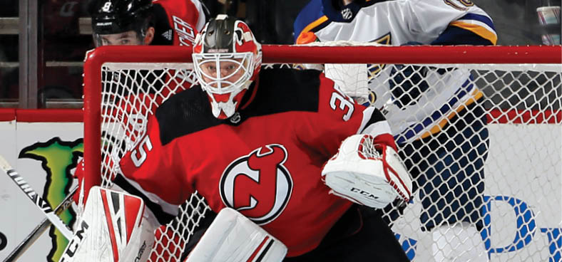 NEWARK, NJ - MARCH 30:  Goalie Cory Schneider #35 of the New Jersey Devils defends his goal during an NHL hockey game against the St  Louis Blues at the Prudential Center in Newark, New Jersey  Blues won 3-2   (Photo by Paul Bereswill Getty Images)