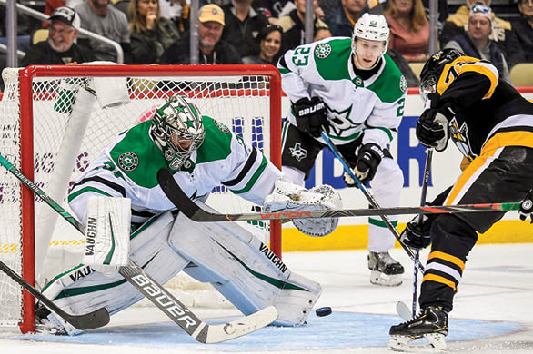 PITTSBURGH, PA - OCTOBER 18: Dallas Stars Goalie Anton Khudobin (35) makes a toe save on Pittsburgh Penguins Right Wing Patric Hornqvist (72) in front during the second period in the NHL game between the Pittsburgh Penguins and the Dallas Stars on October 18, 2019, at PPG Paints Arena in Pittsburgh, PA  (Photo by Jeanine Leech Icon Sportswire via Getty Images)