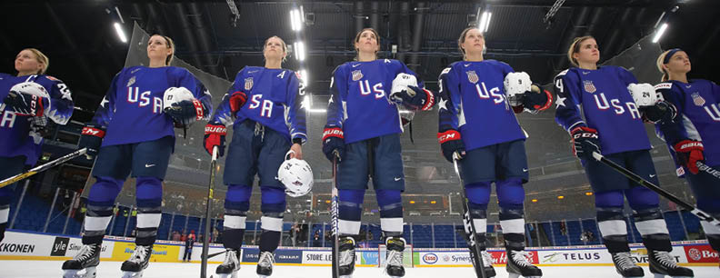 ESPOO, FINLAND - APRIL 11: Team USA players look on during the national anthem following a 4-0 quarterfinal round win against Team Japan at the 2019 IIHF Ice Hockey Women s World Championship at Metro Areena on April 11, 2019 in Espoo, Finland  (Photo by Andre Ringuette HHOF-IIHF Images)