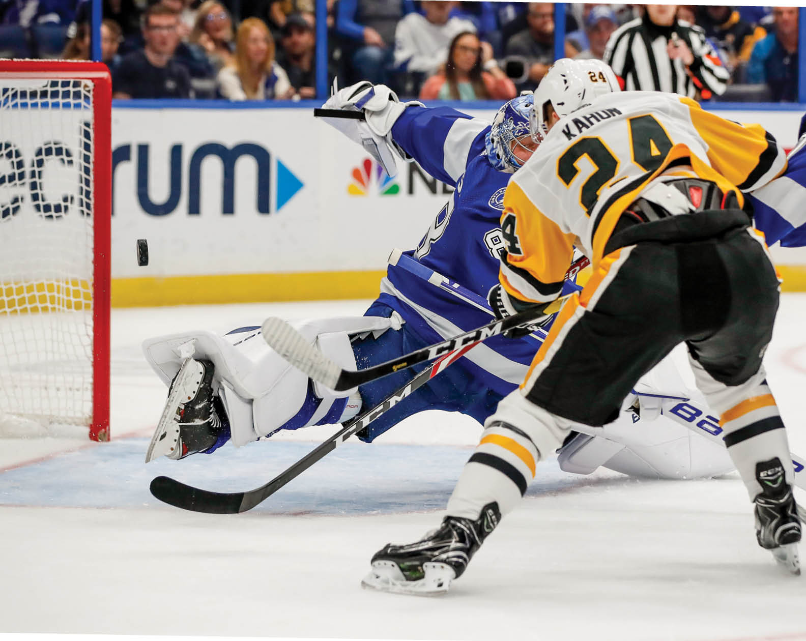 TAMPA, FL - OCTOBER 23: Tampa Bay Lightning goaltender Andrei Vasilevskiy (88) makes a save on a shot from Pittsburgh Penguins center Dominik Kahun (24) in the 1st period of the NHL game between the Pittsburgh Penguins and Tampa Bay Lightning on October 23, 2019 at Amalie Arena in Tampa, FL  (Photo by Mark LoMoglio Icon Sportswire via Getty Images)