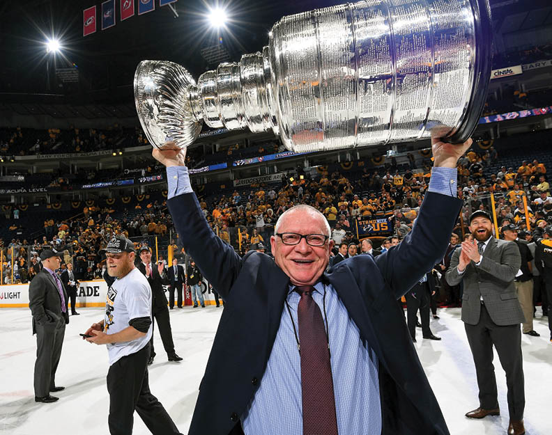 NASHVILLE, TN - JUNE 11:  General Manager Jim Rutherford of the Pittsburgh Penguins lifts the Stanley Cup after Game Six of the 2017 NHL Stanley Cup Final at the Bridgestone Arena on June 11, 2017 in Nashville, Tennessee  The Penguins defeated the Predators 2-0  The Pittsburgh Penguins win the Stanley Cup Final series against the Nashville Predators 4-2   (Photo by Joe Sargent NHLI via Getty Images)