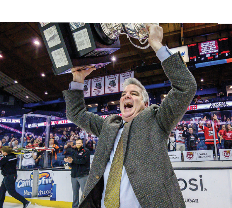 ROSEMONT, IL - JUNE 08: Charlotte Checkers head coach Mike Vellucci celebrates after game five of the AHL Calder Cup Finals against the Chicago Wolves on June 8, 2019, at the Allstate Arena in Rosemont, IL  (Photo by Patrick Gorski Icon Sportswire via Getty Images)