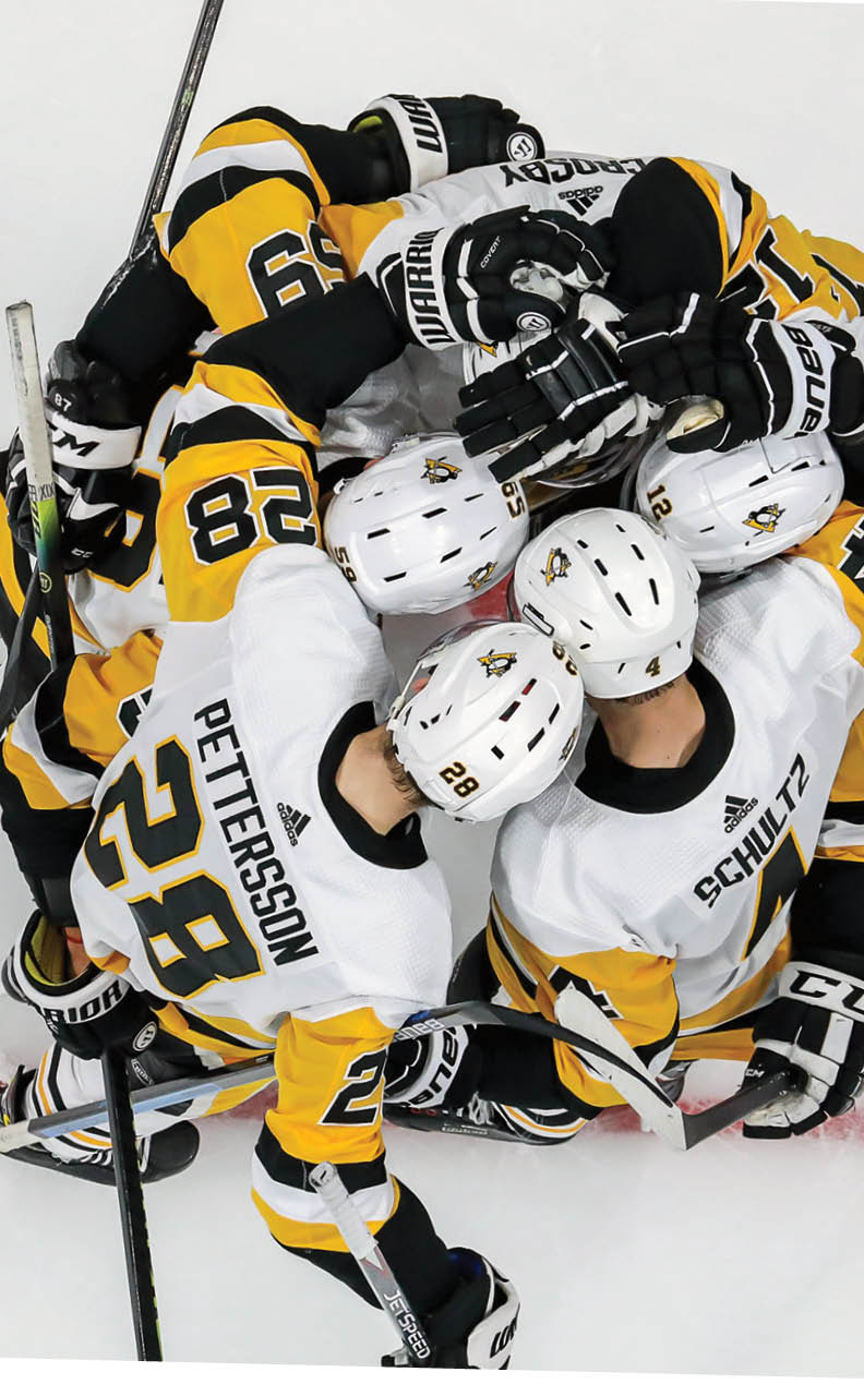WINNIPEG, MB - OCTOBER 13: Marcus Pettersson #28, Jake Guentzel #59, Sidney Crosby #87, Dominik Simon #12 and Justin Schultz #4 of the Pittsburgh Penguins celebrate a second period goal against the Winnipeg Jets at the Bell MTS Place on October 13, 2019 in Winnipeg, Manitoba, Canada  (Photo by Jonathan Kozub NHLI via Getty Images)