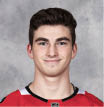 CHICAGO, IL - SEPTEMBER 12:  Kirby Dach #77 of the Chicago Blackhawks poses for his official headshot for the 2019-2020 season on September 12, 2019 at the United Center in Chicago, Illinois  (Photo by Chase Agnello-Dean NHLI via Getty Images) *** Local Caption *** Kirby Dach