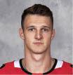 CHICAGO, IL - SEPTEMBER 12:  Dominik Kubalik #8 of the Chicago Blackhawks poses for his official headshot for the 2019-2020 season on September 12, 2019 at the United Center in Chicago, Illinois  (Photo by Chase Agnello-Dean NHLI via Getty Images)*** Local Caption *** Dominik Kubalik