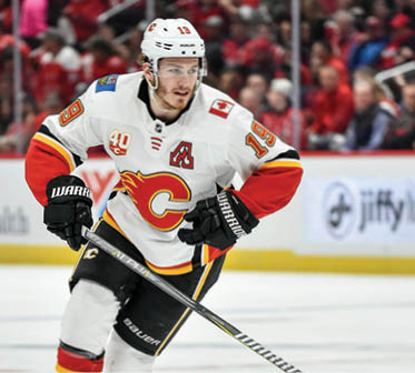 WASHINGTON, DC - NOVEMBER 03: Flames left wing Matthew Tkachuk (19) skates into the offensive zone during the Calgary Flames vs  Washington Capitals on November 3, 2019 at Capital One Arena in Washington, D C   (Photo by Randy Litzinger Icon Sportswire via Getty Images)