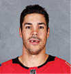 CALGARY, CANADA   SEPTEMBER 12: Travis Hamonic of the Calgary Flames poses for his official headshot for the 2019-2020 season on September 12, 2019 at the Scotiabank Saddledome in Calgary, Canada  (Photo by Brad Watson NHLI via Getty Images) *** Local Caption *** Travis Hamonic