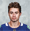 VANCOUVER, CANADA - SEPTEMBER 12: Quinn Hughes #43 of the Vancouver Canucks poses for his official headshot for the 2019-2020 season on September 12, 2019 at Rogers Arena in Vancouver, British Columbia, Canada   (Photo by Jeff Vinnick NHLI via Getty Images)