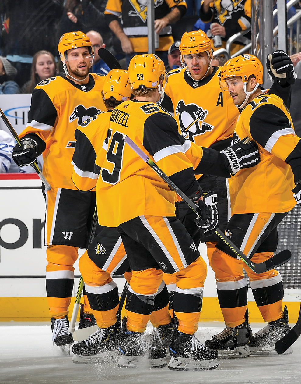 PITTSBURGH, PA - NOVEMBER 16:  Evgeni Malkin #71 of the Pittsburgh Penguins celebrates his goal with teammates during the first period against the Toronto Maple Leafs at PPG PAINTS Arena on November 16, 2019 in Pittsburgh, Pennsylvania  (Photo by Joe Sargent NHLI via Getty Images)