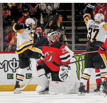 NEWARK, NJ - NOVEMBER 15: Jack Johnson #3 (L) of the Pittsburgh Penguins reacts after scoring a goal against the New Jersey Devils during the game at the Prudential Center on November 15, 2019 in Newark, New Jersey  (Photo by Andy Marlin NHLI via Getty Images)