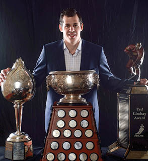 LAS VEGAS, NV - JUNE 20:  Evgeni Malkin of the Pittsburgh Penguins poses after winning the Hart Trophy, the Art Ross Trophy and the Ted Lindsay Award during the 2012 NHL Awards at the Encore Theater at the Wynn Las Vegas on June 20, 2012 in Las Vegas, Nevada   (Photo by Harry How Getty Images)