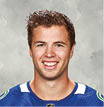 VANCOUVER, CANADA - SEPTEMBER 13: Ben Hutton #27 of the Vancouver Canucks poses for his official headshot for the 2018-2019 season on September 13, 2018 at Rogers Arena in Vancouver, British Columbia, Canada   (Photo by Jeff Vinnick NHLI via Getty Images)