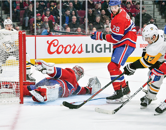 MONTREAL, QC - JANUARY 4: Brandon Tanev #13 of the Pittsburgh Penguins fires a shot to score the winning goal on goalie Carey Price #31 of the Montreal Canadiens in the NHL game at the Bell Centre on January 4, 2020 in Montreal, Quebec, Canada  (Photo by Francois Lacasse NHLI via Getty Images)