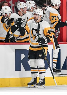 MONTREAL, QC - JANUARY 4: Zach Aston-Reese #46 of the Pittsburgh Penguins celebrates with the bench after scoring a goal against the Montreal Canadiens in the NHL game at the Bell Centre on January 4, 2020 in Montreal, Quebec, Canada  (Photo by Francois Lacasse NHLI via Getty Images)