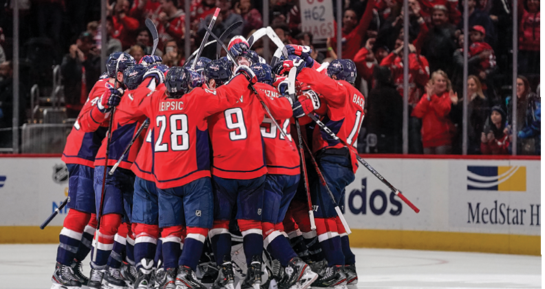 WASHINGTON, DC - JANUARY 05: The Washington Capitals celebrate after defeating the San Jose Sharks 5-4 in overtime at Capital One Arena on January 5, 2020 in Washington, DC  (Photo by Patrick McDermott NHLI via Getty Images)