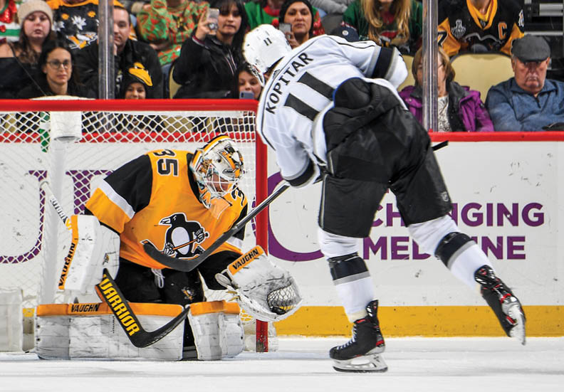 PITTSBURGH, PA - DECEMBER 14:  Tristan Jarry #35 of the Pittsburgh Penguins makes a save on a shootout attempt by Anze Kopitar #11 of the Los Angeles Kings at PPG PAINTS Arena on December 14, 2019 in Pittsburgh, Pennsylvania  (Photo by Joe Sargent NHLI via Getty Images)