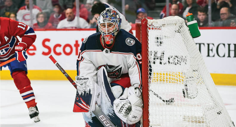 MONTREAL, QC - FEBRUARY 02: Columbus Blue Jackets goalie Elvis Merzlikins (90) tracks the play during the Columbus Blue Jackets versus the Montreal Canadiens game on February 02, 2020, at Bell Centre in Montreal, QC (Photo by David Kirouac Icon Sportswire via Getty Images)